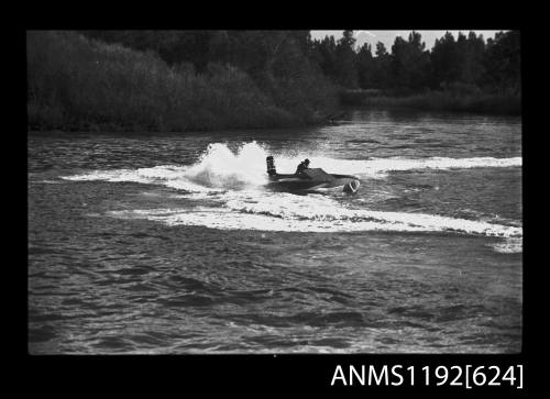 Black and white negative number 6A depicting view of hydroplane approaching marker buoy, starboard side view