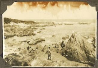 A man standing on rocks