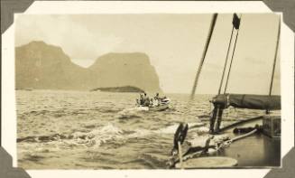 Row boat viewed from deck of MALUKA