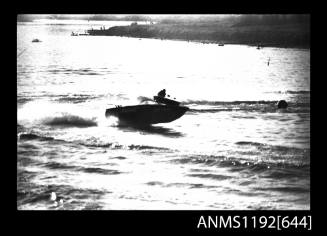 Black and white negative number 26A depicting view of HORNET HY18N, inboard engine, completing a turn, starboard side view