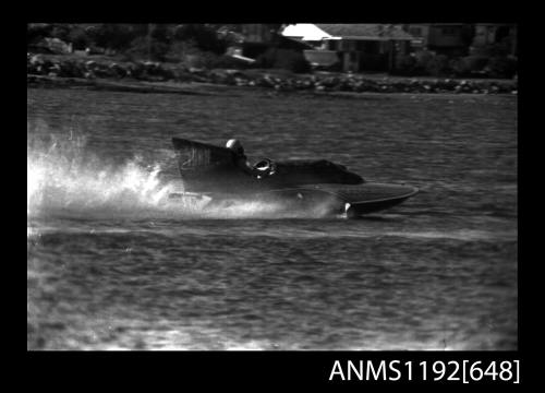 Black and white negative number 3A depicting view of 160n hydroplane at speed, stern/ starboard side view