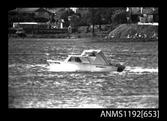 Black and white negative number 8A depicting view of  MISS DURRAS OZ59N cabin cruiser under way, port side view