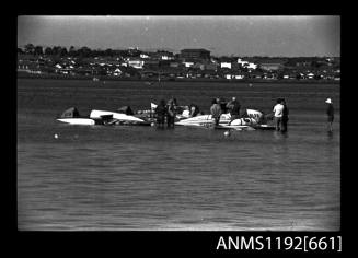Hydroplanes preparing for a race