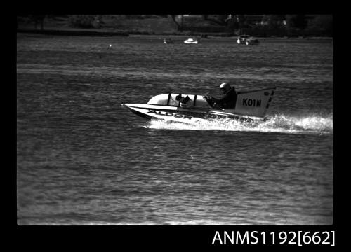 Black and white negative number 17A depicting view of ALDOR KO1N hyroplane at speed, port side view