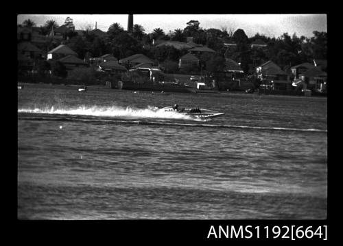 Black and white negative number 19A depicting view of CLOVER Hydroplane at speed, starboard side view