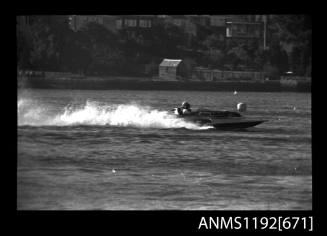 Black and white negative number 26A depicting view of AARINA Hydroplane at speed, starboard side view