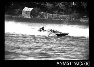 Black and white negative number 34 depicting view of hydroplane at speed, starboard side view