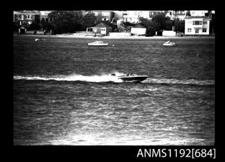 Black and white negative number 13 depicting view of KING-O-KATS , open power boat, outboard engine