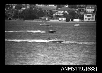 Black and white negative number 17 depicting view of KING-O-KATS And KATCH-MEE open power boats, outboard engines