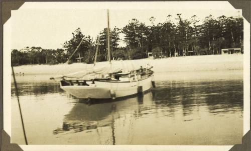 MALUKA moored at a beach