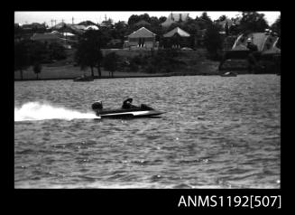 Black and white negative number 25A depicting view of hydroplane at speed
