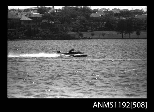 Black and white negative number 26A depicting view of hydroplane at speed