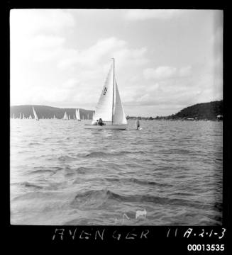 Vee Ess class dingy  AVENGER II coming up to marker buoy on Pittwater.