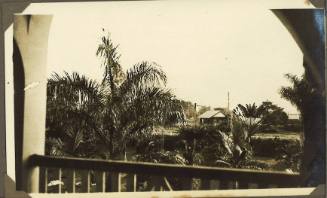 A landscape viewed from a verandah