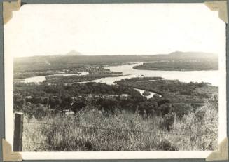 A landscape with a river in distance