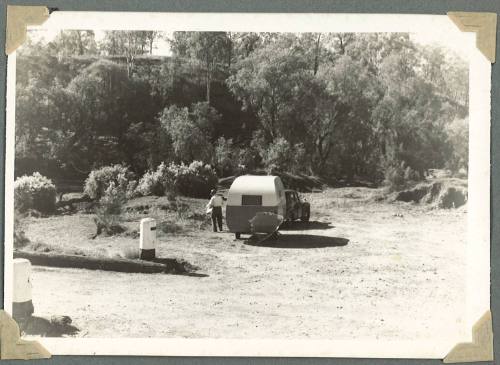 A caravan parked at a camping site