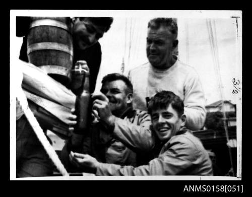 Crew of JOSEPHINE celebrating in Constitution Dock