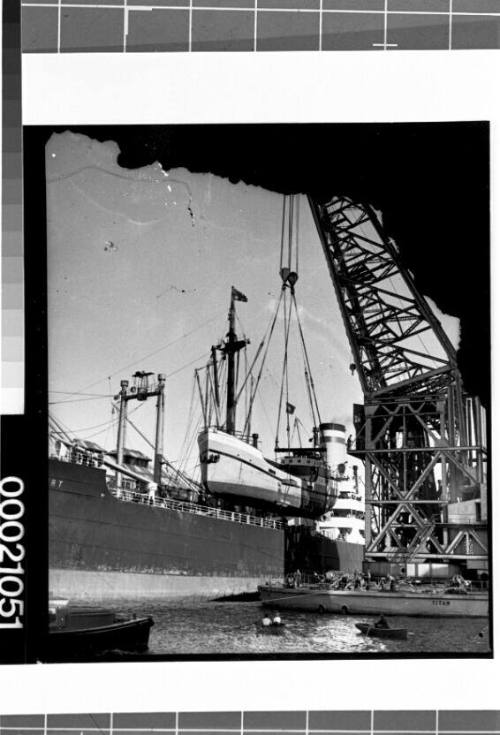 Unloading LE PHOQUE from the deck of SS STASSFURT using the floating crane Titan