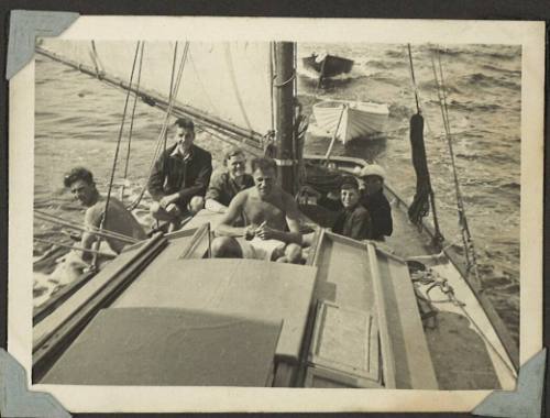 A group of young men on the deck of MALUKA