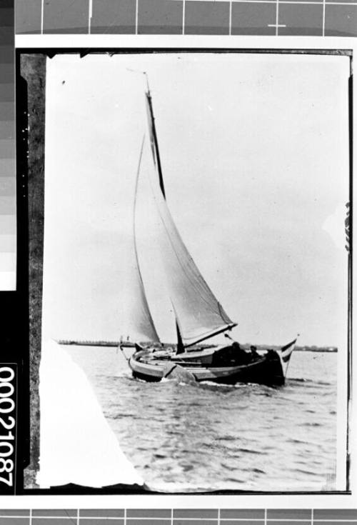 Dutch yacht with lee board sailing in a light breeze