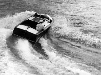 Stern view of a speedboat on Sydney Harbour