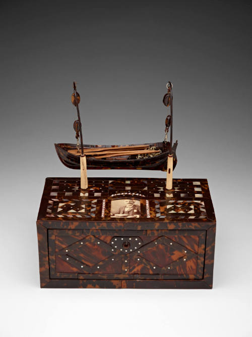 Turtle and pearl shell inlaid box in the form of a boat