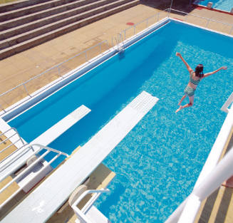 Girl leaping of the board, Ryde Swimming Centre
