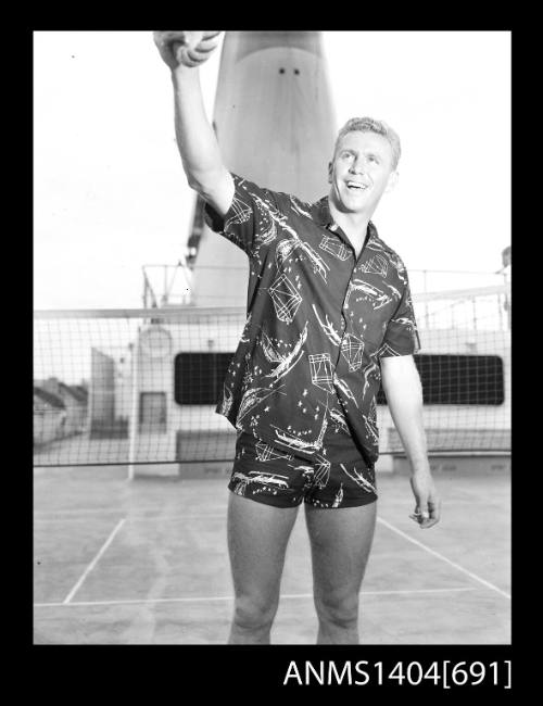 Photographic negative of a male model posing on a ship