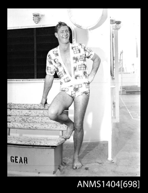 Photographic negative of a model posing on a ship