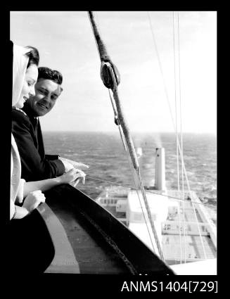 Photographic negative of a couple on top of a cruise ship