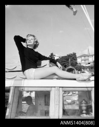 Vicki Jarman modelling on a boat