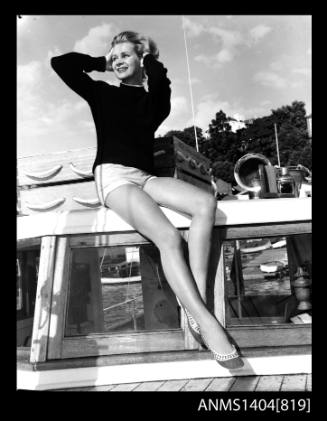 Vicki Jarman modelling on a boat