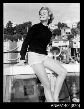 Vicki Jarman modelling on a boat