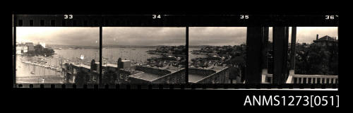 Strip of black-and-white negatives, consisting of four images of Sydney views from Denis George's apartment