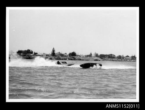 Two racing speed boats