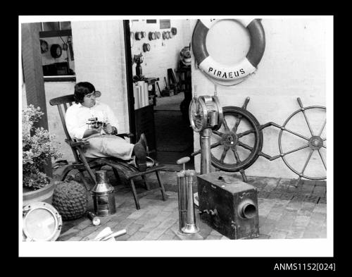 Maritime collection, owner holding a sextant