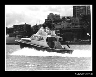 Print of BERTRAM 38102 cruiser at speed in Sydney Harbour