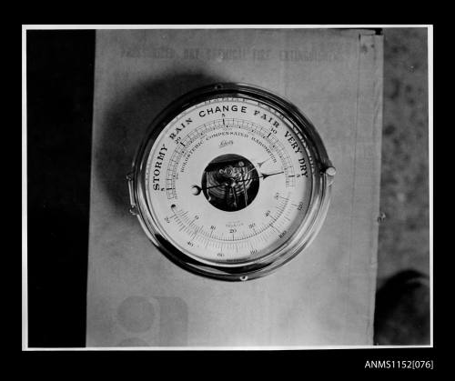 Print depicting Schatz Holosteric compensated barometer, and thermometer