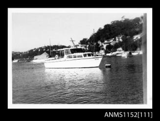 Print depicting G33N cabin cruiser moored at buoy in a river