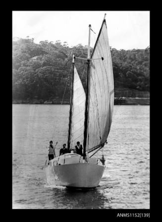 Half cabin, ketch rigged with gunter main sail sailing boat under way