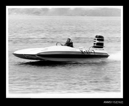 The imageof a TIGER X-U-7 Hydroplane at high speed