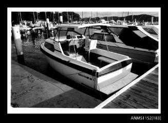 Hydroplane Kingston 580 moored stern to wharf