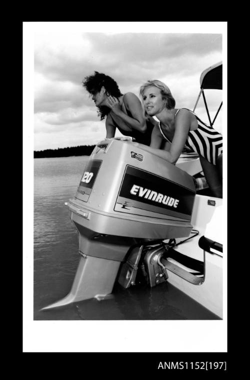 Evinrude 120  large outboard engine mounted on boat