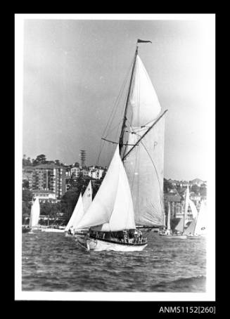 The yacht unidentified with gaff rig, main sail, gaff topsail, staysail, and jib sail all set
