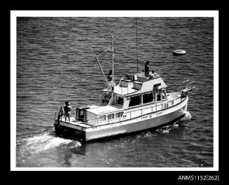 The elevated view of cabin cruiser Grand banks Under way