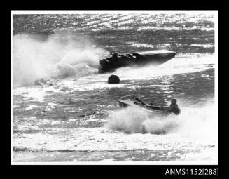 Hydroplane ARK FERN driven by Barry Chaplin rounding a marker buoy at Silverwater followed by COBBA driven by Bob Carol