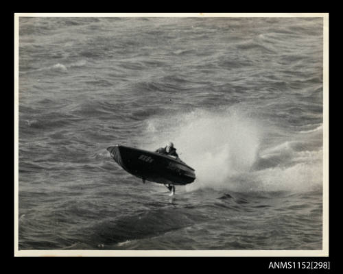 Power boat SWIFTA BX6N at clear of water at high speed