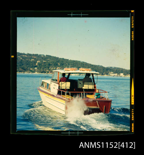 Two transparencies depicting cabin cruisers