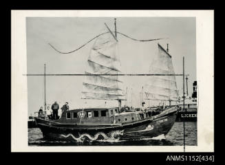 YUM YUM three masted cabin cruiser with hull and sails styled on that of chinese junk