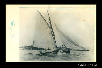 The image of sailing boat with gaff main sail